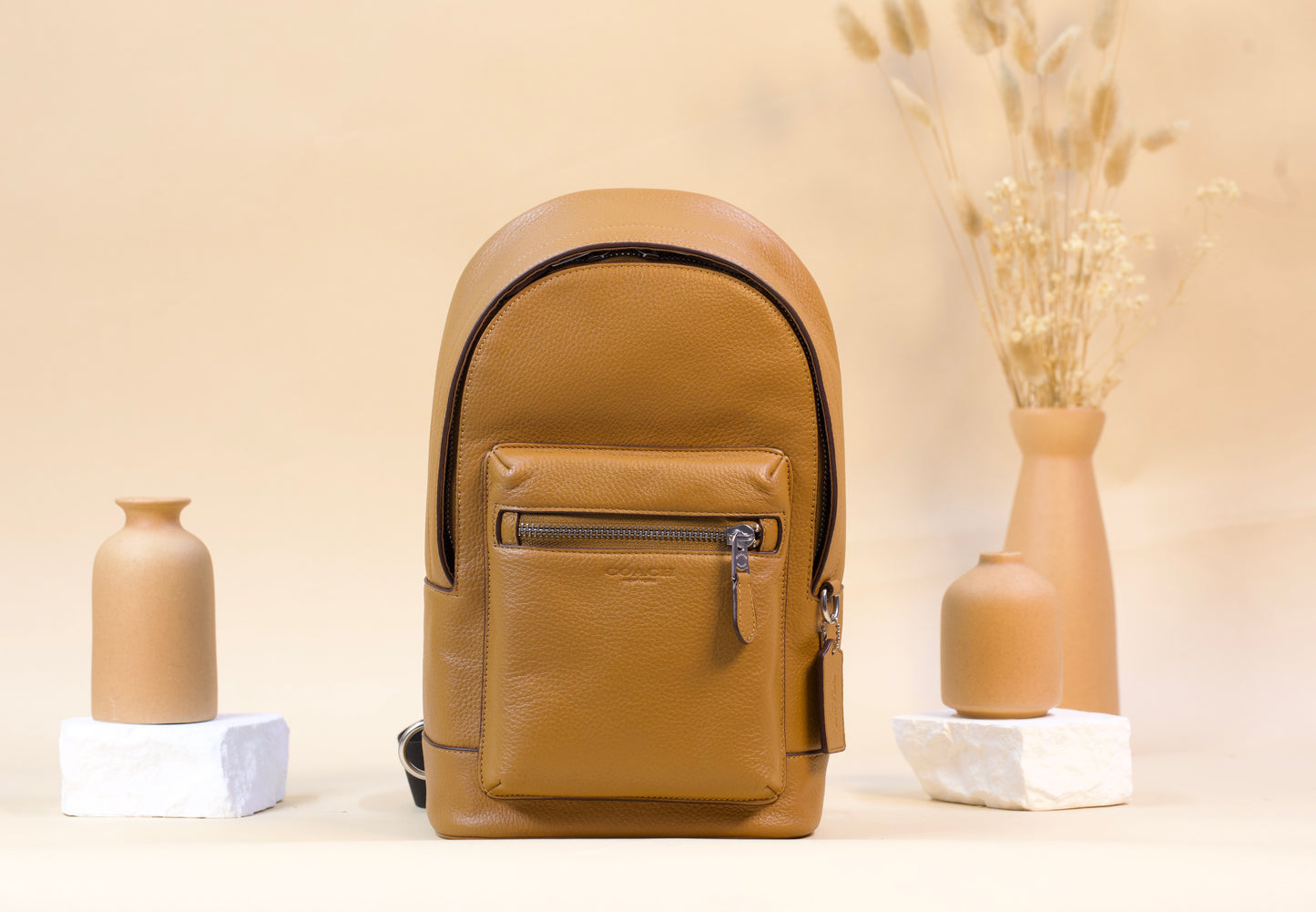 COACH WEST PACK PEBBLE LEATHER IN LIGHT SADDLE