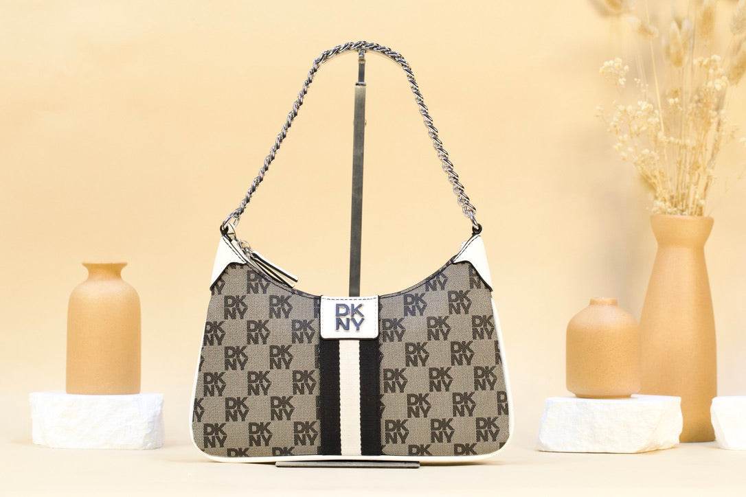 DKNY R54E6P16 LIORA LG TZ CROSSBODY NATURAL MULTI